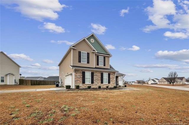 view of front of house with central AC, a front lawn, and a garage