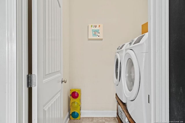 washroom featuring separate washer and dryer