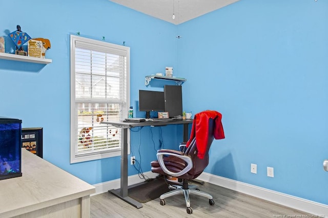 home office featuring light wood-type flooring