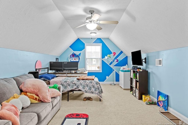 rec room with carpet, ceiling fan, a textured ceiling, and vaulted ceiling