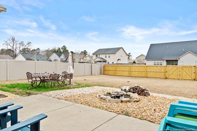 view of patio featuring a fire pit