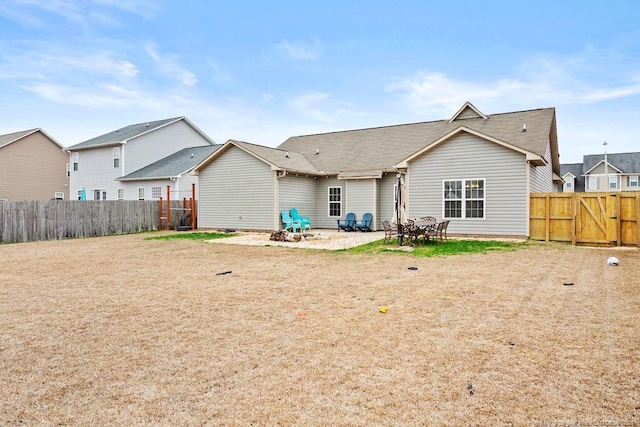 back of house with a patio area