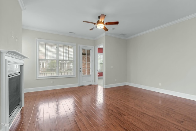 unfurnished living room with crown molding, ceiling fan, and wood-type flooring