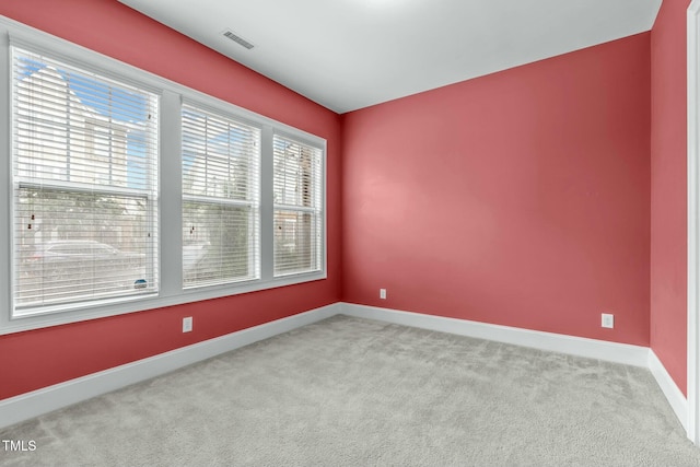 view of carpeted spare room