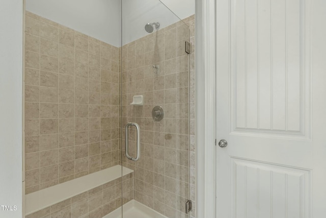 bathroom with an enclosed shower