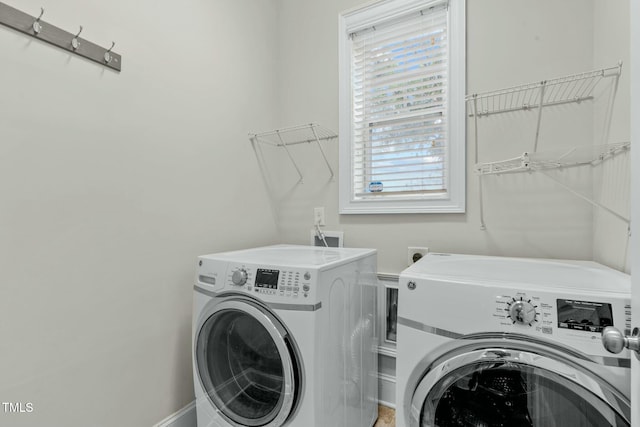 laundry room featuring independent washer and dryer