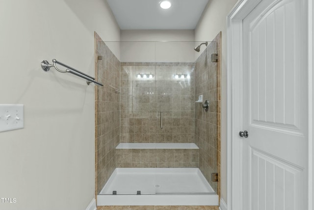 bathroom featuring an enclosed shower