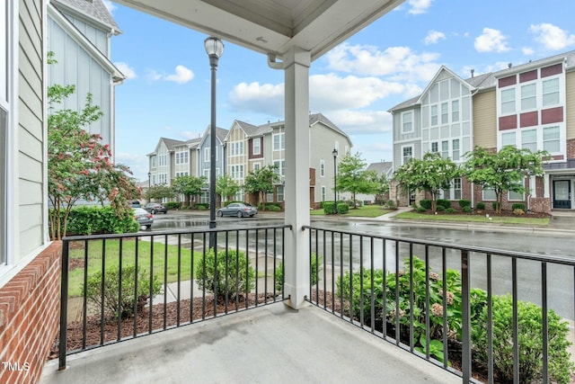 balcony featuring covered porch