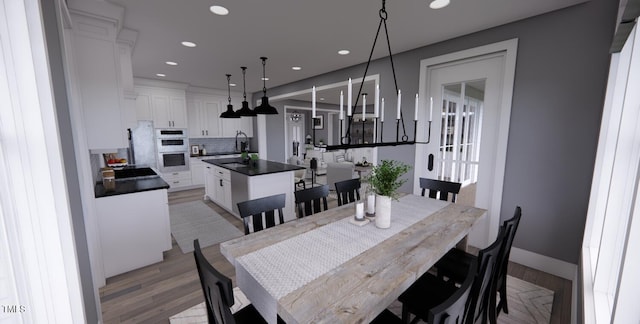 dining room featuring light hardwood / wood-style flooring