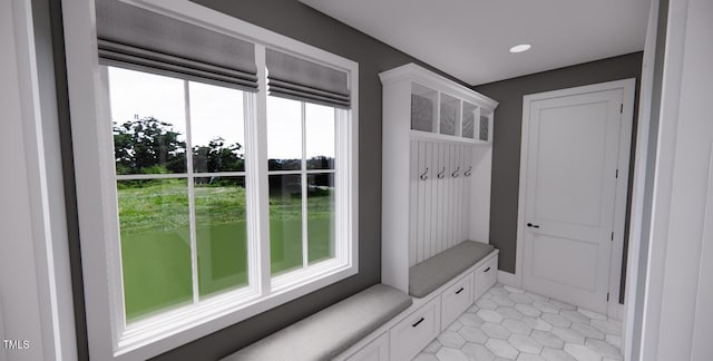 mudroom with light tile patterned floors