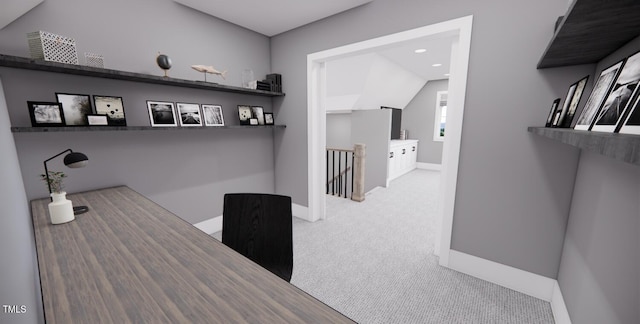 office area with carpet flooring and lofted ceiling