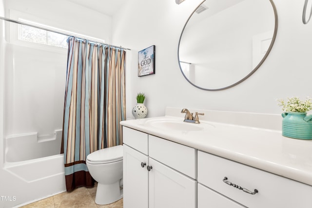 full bathroom featuring tile patterned floors, toilet, vanity, and shower / tub combo with curtain