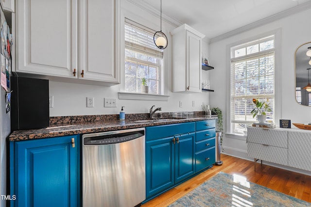 kitchen featuring dishwasher, blue cabinetry, crown molding, white cabinets, and sink