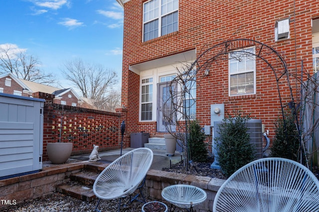 view of patio with central AC unit