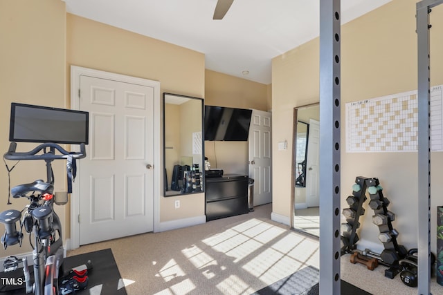 workout area with carpet floors and ceiling fan