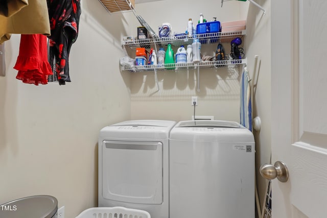 washroom with separate washer and dryer