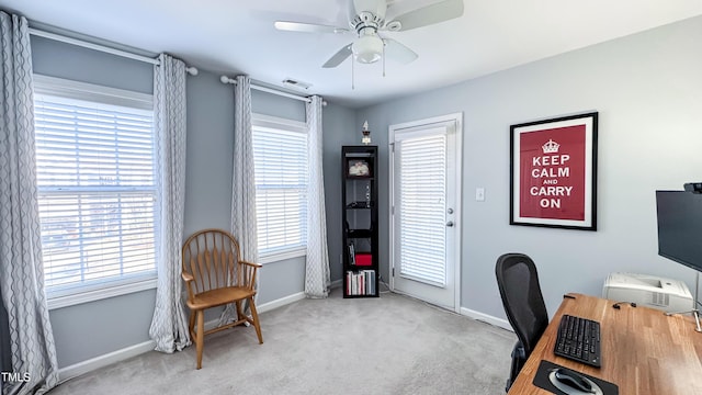 office space with ceiling fan and light colored carpet