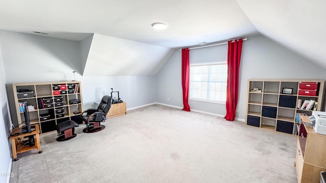 interior space featuring carpet and vaulted ceiling