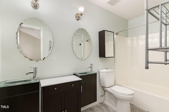 full bathroom with vanity, shower / washtub combination, and toilet