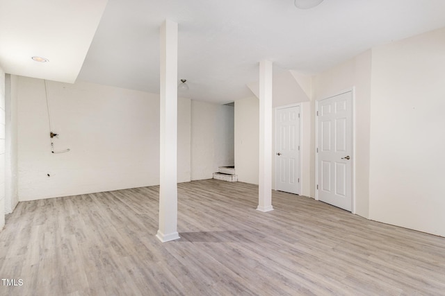 basement featuring light hardwood / wood-style floors