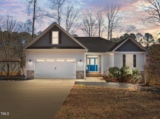 view of front of property with a garage