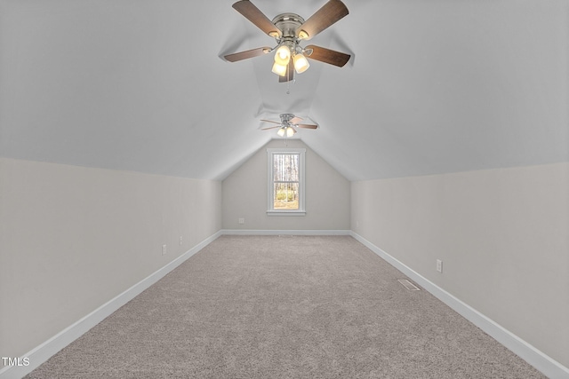 bonus room featuring carpet floors, ceiling fan, and vaulted ceiling