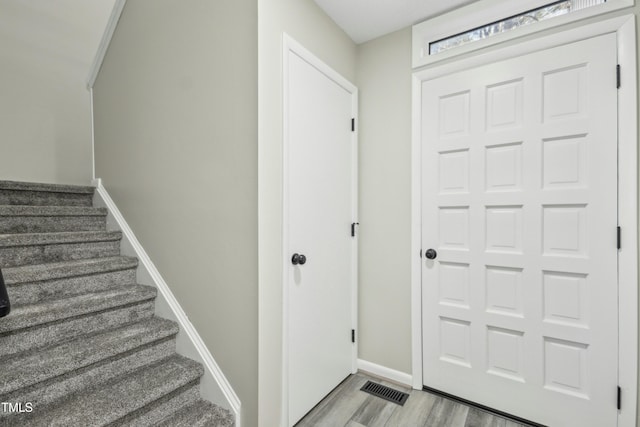 foyer with light hardwood / wood-style flooring