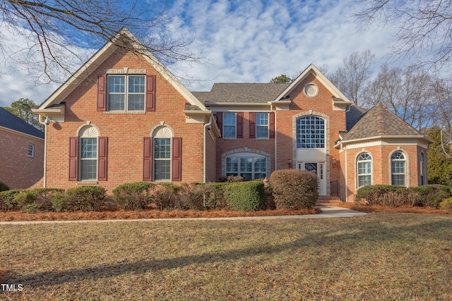 front of property with a front yard