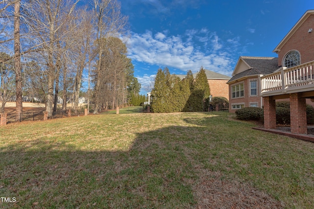 view of yard featuring a deck