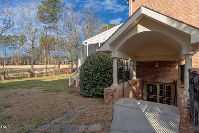 view of property exterior with a yard