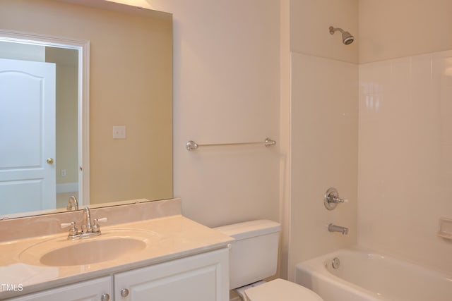 full bathroom with shower / washtub combination, toilet, and vanity