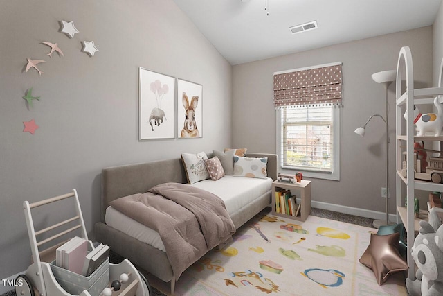 bedroom featuring vaulted ceiling, carpet, visible vents, and baseboards