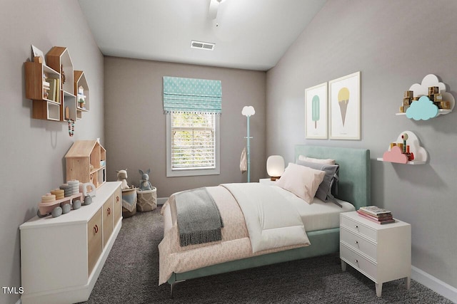 bedroom with lofted ceiling, visible vents, dark carpet, and baseboards