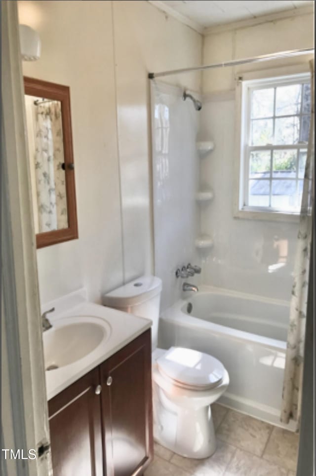 full bathroom featuring tile patterned floors, vanity, toilet, and shower / bathtub combination with curtain