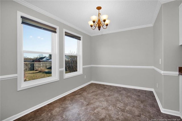 empty room with ornamental molding and a chandelier