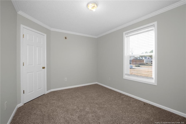 empty room with carpet and crown molding