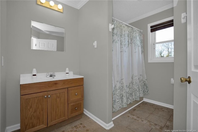 bathroom featuring crown molding, tile patterned flooring, and vanity