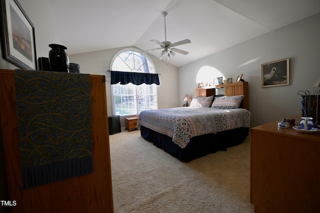 bedroom with lofted ceiling, light carpet, and ceiling fan