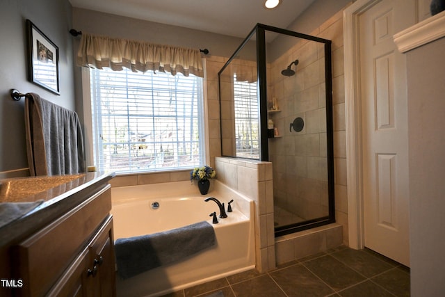 bathroom with shower with separate bathtub and tile patterned floors