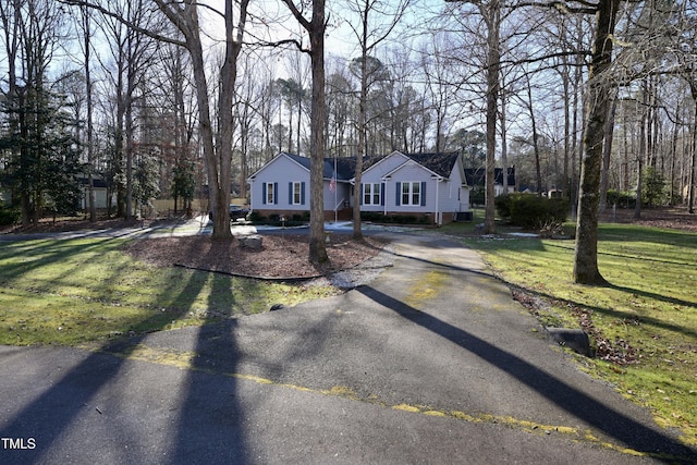 view of front of home with a front lawn