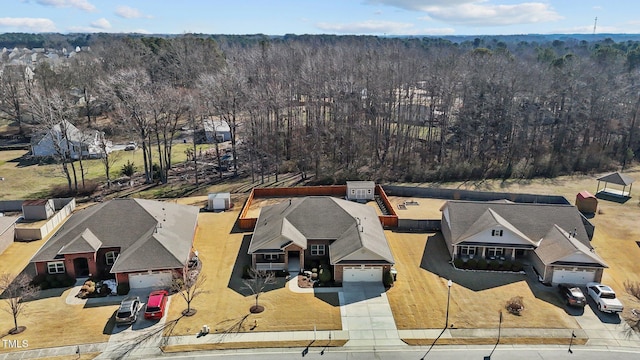 aerial view with a wooded view