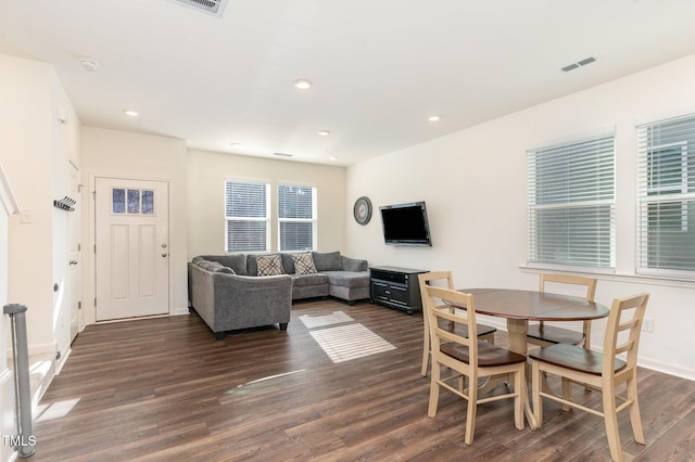 dining room featuring dark hardwood / wood-style flooring