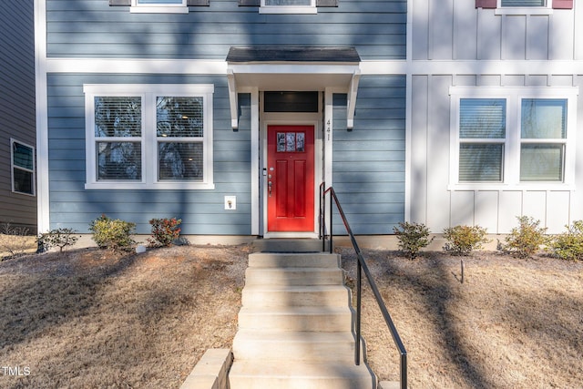 property entrance with board and batten siding