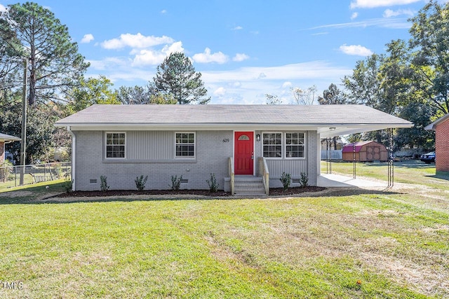 ranch-style house featuring a front lawn