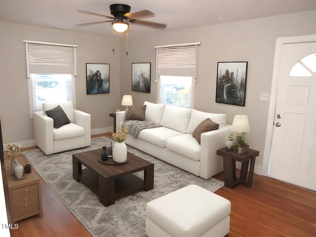 living room featuring hardwood / wood-style floors, a wealth of natural light, and ceiling fan