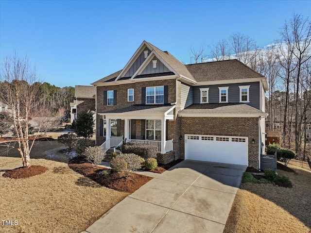 craftsman inspired home featuring a porch and a garage