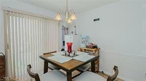 dining room featuring an inviting chandelier