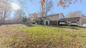 view of yard with a carport