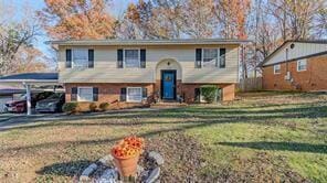 view of front of property with a front lawn