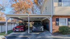 view of car parking with a carport